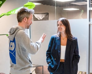 Michel_Charlotte_office_talking_vertical